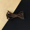 Venta al por mayor de fábrica Botas Baojie Zapatos de cuero Cordones para zapatos Botas militares Zapatos de caña alta Redondo 4.5 mm Poliéster Tejido Color puro Zapatos