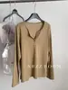 Camiseta Henley casual de manga larga con botones, estilo coreano, para mujer, otoño de 2026, corte holgado, adelgazante, versátil y adecuada para el trabajo