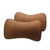 Venta al por mayor de fábrica almohada de cuero para reposacabezas de coche almohada de cuero para el cuello almohada de piel de vaca almohada de hueso suministros para coche con logo de mapa