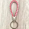 Llavero de cuerda de cuero trenzado simple creativo colgante de muñeca linda accesorios de llave para parejas tendencia regalos pequeños venta al por mayor