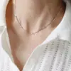 Novo Colar de Corrente Ossos de Cobra com Contas Redondas Simples Versátil de Nicho para Mulheres com Senso de Design, Luxo Leve e Corrente de Clavícula em Camadas de Alta Qualidade