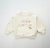 Nova Moletom Infantil Outono 2025 com Bordado para Meninos e Meninas, Design de Dinossauro com Letras, Estilo Japonês Roupas Infantis Atacado