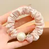 Diadema de Pelo Plisada con Volantes de Alta Gama Estilo Coreano 2026 Nueva Cuerda para Moño y Cola de Caballo para Mujer