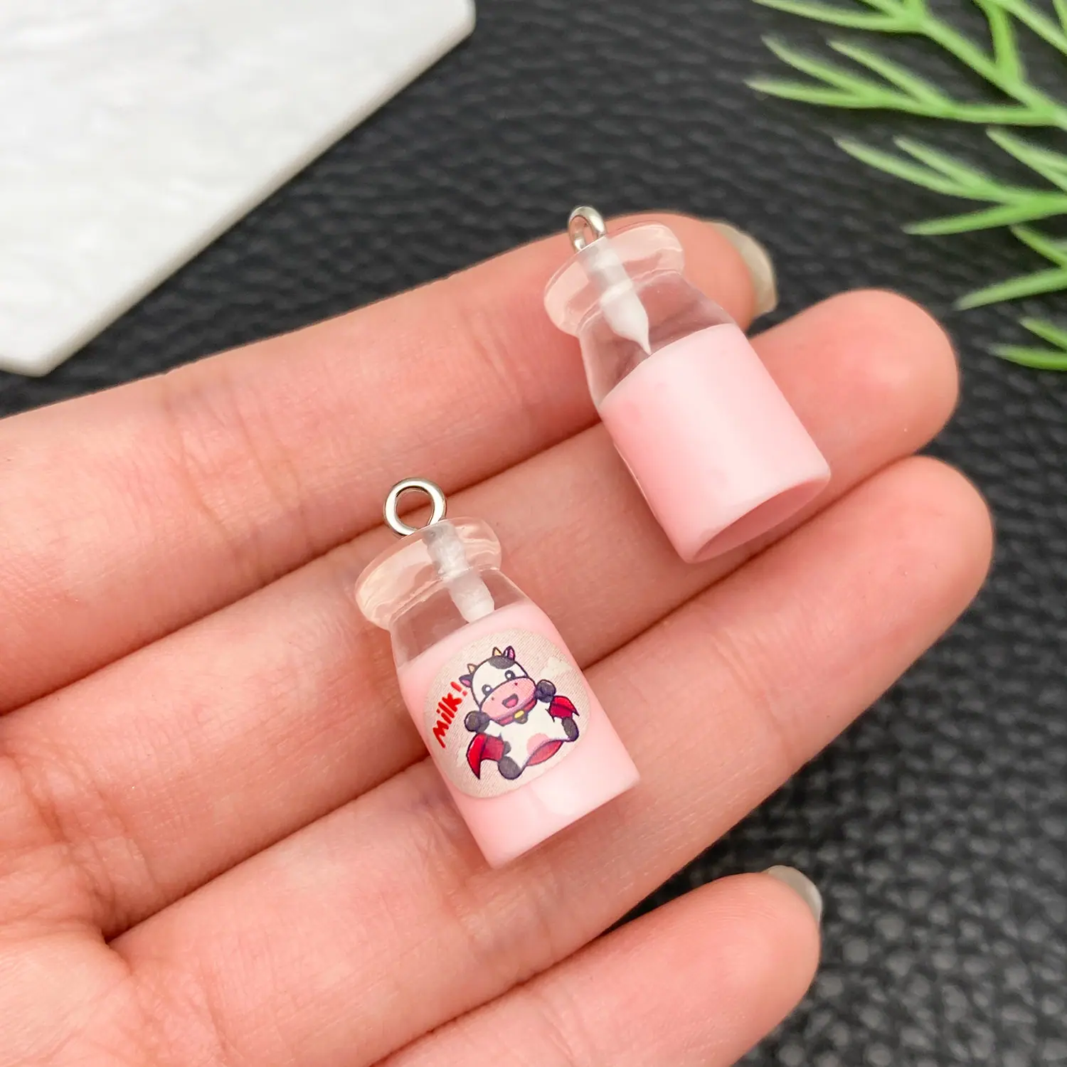 24098-JD3-透明粉色牛奶奶瓶24x11x11mm-1