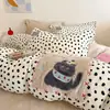 Nuevo conjunto de cuatro piezas de alta calidad, de moda para otoño/invierno, con tejido de terciopelo de leche engrosado, estampado de leopardo, aplique de dibujos animados y diseños bordados para abrigarse