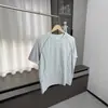 Nuevo top de verano para hombre de moda, color amarillo verdoso claro, manga corta raglán, con costuras curvas de contraste, corte holgado, cuello redondo, casual y versátil