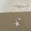Collar con colgante de estrella de mar blanco plateado para mujer, nicho, lujo ligero, sensación de alta gama, cadena para la clavícula, estilo vacaciones de verano, accesorio de cadena para el cuello versátil