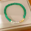 Pulseira de contas em ouro bicolor 18K, toque de luxo leve de nicho de alta qualidade, simples e elegante, joias versáteis e da moda para atacado