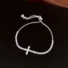 Pulsera de cordón con colgante de cruz de circonita, sensación de lujo ligero de alta gama, diseño de nicho a la moda, accesorio de mano único