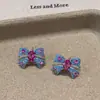 Brincos Coloridos com Laço Design Retrô de Nicho para Mulheres Novo Estilo 2025 Brincos Elegantes de Luxo Leve