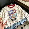 Camiseta de manga larga a rayas de retazos de algodón puro para niños, nuevo estilo primavera y otoño, camiseta básica elegante y holgada para niños