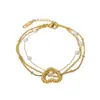 Pulsera Elegante con Perlas y Diamantes Incrustados en Forma de Corazón Hueco, Estilo Dulce y Fresco, de Lele Jewelry, Transfronteriza Europea y Americana