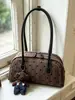 Bolsa de lona para mujer, nueva colección otoño/invierno 2026, bolsa tipo almohada de gran capacidad, bolso de hombro de moda, bolso de axila, bolso para ir al trabajo, bolso de lunares
