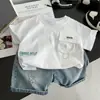 Ropa Infantil 2026 Nuevo Estilo Conjunto de Verano para Niños Moda Tendencia Casual Ropa de Verano de Manga Corta para Bebé Conjunto de Dos Piezas Tendencia