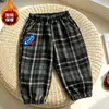 Pantalones de Pana con Forro Polar Nuevos para Niños Otoño/Invierno 2026, Pantalones Jogger Casuales Sueltos Estilosos Coreanos a Cuadros para Exportación
