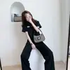 Conjunto Esportivo Casual Popular para Mulheres 2026 Verão Novo Tendência Camisa Polo Curta e Calça de Pernas Largas Conjunto de Duas Peças
