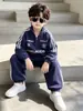 2179 Conjunto de Otoño para Niños 2026 Nueva Ropa Deportiva para Niños Sudadera con Cuello Alto de Primavera y Otoño para Bebé Conjunto de Dos Piezas Moderno