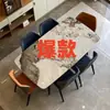 Mesa de jantar de ardósia para casas pequenas, conjunto de mesa e cadeiras de jantar retangular moderno simples de luxo leve de alta qualidade e brilhante
