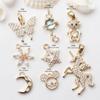 Pacote de 14K ouro micro incrustado acessórios de zircão floco de neve borboleta flor lua pingente diy colar brincos pingente material