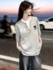 Camiseta de algodón 100% puro, marca de moda popular, diseño falso de dos piezas, cuello redondo, manga corta, para hombres y mujeres, top de verano holgado, corte ajustado, estilo Ins