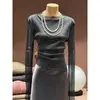 Tejido de punto de manga larga con cuello semi-alto para mujer, Nuevo estilo de principios de primavera, Top plisado ajustado, Jersey de estilo minimalista