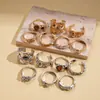 Set de Siete Piezas de Anillos Abiertos Plegados tipo Metal Europeo y Americano con Pedrería, Joyería de Gama Alta Retro de Nicho Único para Mujeres