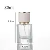 Botella de perfume cilíndrica de vidrio transparente, con franjas verticales de 30 ml/50 ml, del fabricante, botella vacía portátil recargable con atomizador de presión