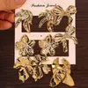 Joyería de Oreja de Venta Caliente Transfronteriza Europea y Americana Metal Geométrico Flor de Amor Set de Pendientes para Mujer Accesorios de Pendientes de Gama Alta