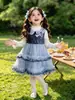 Conjunto de Vestido Bolo com Gola de Boneca Cartoon Outono para Meninas 2026 Novo Conjunto de Duas Peças Vestido Princesa Infantil Roupa Infantil Atacado