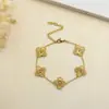 Pulseira de Aço Titânio 15mm Trevo de Quatro Folhas Banho de Ouro 18K Transfronteiriça Tendência, Pulseira de Nicho Fashion, Joias Femininas, Luxo Leve