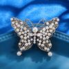 Broche de temperamento de alta gama estilo antiguo hecho a mano europeo y americano, pin de solapa retro de corte occidental, accesorios de ramillete
