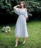 Vestidos de Madrinha em Estoque para Mulheres 2026 Novo Estilo Comprimento Médio Slim-Fit Estilo Fada Elegante Vestido de Noite para Performance de Anfitriã
