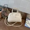 Bolsa Boston Feminina 2025 Nova Primavera e Verão Tendência Moda Simples Bolsa de Ombro Crossbody Bolsa Almofada