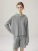 Suéter de cachemira 2026 Estilo Otoño/Invierno para mujer con capucha tejido de ochos capa base estilo dulce conjunto de dos piezas suéter cálido de temperamento