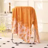 Toalla de baño jacquard de coralina suave y absorbente, de secado rápido, cómoda, versátil y se puede colgar; una toalla grande para uso doméstico