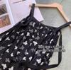 Saia de Suspensório com Estampa de Borboleta Fundo Preto Atmosfera Francesa Vestido de Meio Comprimento Sem Mangas para Mulheres 25 Verão H0731D