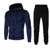 Nuevo conjunto deportivo con capucha de forro polar de color liso europeo y americano para otoño e invierno, sudadera y pantalón de chándal para hombre, casual, con puntos y cierre de cremallera