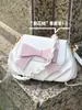 Bolso tipo saddle de mujer 2026 nuevo de verano versátil para hombro y cruzado, bolso de nicho para el día a día tipo nube, bolso de axila para mujer