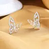 Brincos Borboleta Zircônia Flash de Design de Nicho Luxo Leve Feminino Simples Versátil Micro-Embutidos Vazados Atacado