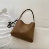 2026 Nuevo Bolso Cubo Retro Simple de Alto Valor Personalidad Simple Nicho para el Trabajo Viaje Casual Bolso de Hombro de Moda