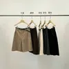 ¡Trece Fábricas de Guangzhou! Moda de alta gama 2026 otoño nuevo adelgazantes de pierna ancha de pana de pierna recta shorts para mujer