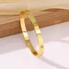 Pulseira de aço titânio estilo ins europeu e americano de trevo de quatro folhas, luxo leve, versátil com incrustação de diamante e fecho moderno, para mulheres