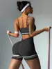 Conjunto de yoga con bloques de color transfronterizo para mujer, sujetador deportivo a prueba de impactos para correr al aire libre, conjunto de dos piezas de shorts de fitness de cintura alta que levantan los glúteos