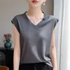 Chaleco blanco sin mangas de cuello en V para mujer, camiseta de punto blanca, top versátil de corte holgado que estiliza, adecuado para llevar debajo de un blazer