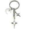 Llavero Popular de Cuatro Puntas Cruz Estrella Luna Transfronterizo Moda Colgante Decoración Simple para Bolso Amazon