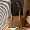 Bolsa Tote Retro de Design de Nicho Transfronteiriço para Mulheres 2026 Nova Versátil para o Dia a Dia Moda Bolsa de Ombro