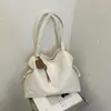 Bolsa de mão de cor sólida para mulheres, estilo coreano, chique sem esforço, coleção de outono 2026, bolsa de ombro, bolsa tote com design estiloso