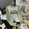 Camiseta básica de cuello redondo con mangas raglán y bloques de color americano para mujer, diseño de nicho de primavera y otoño, de algodón puro, de manga larga y corte entallado.
