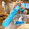 Llavero de pez dorado pequeño flotante para hombres y mujeres, exquisito, lindo, colgante de llavero de coche de botella flotante, colgante de bolso, pequeño regalo