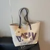 Bolsa Tote Grande de Lona Casual para Viajes de Primavera 2026 Bolso de Hombro Simple de Moda con Estampado
